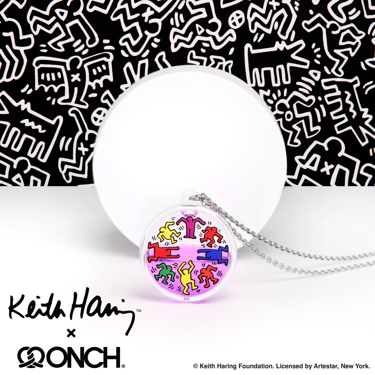 Keith Haring art with eight dancing rainbow men printed on round clear acrylic pendant filled with purple liquid. Black and white Keith Haring all over print background with collaboration logo with designer ONCH