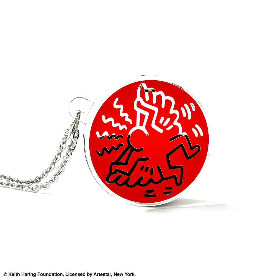 Keith Haring art with red angel printed on round clear acrylic pendant filled with black liquid 